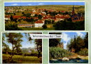Blick über Wemmetsweiler mit kath. Pfarrkirche, Schwesternhaus und Kindergarten, Partie hinter der Kirche sowie Kirche und Pfarrhaus vom Illtal aus gesehen.